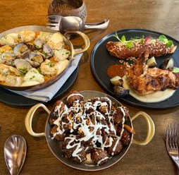 Ponto Lago signature dishes Baked Huevos Rancheros
Seared Scallops
Mary's Organic Chicken Breast & Leg Enmolada
